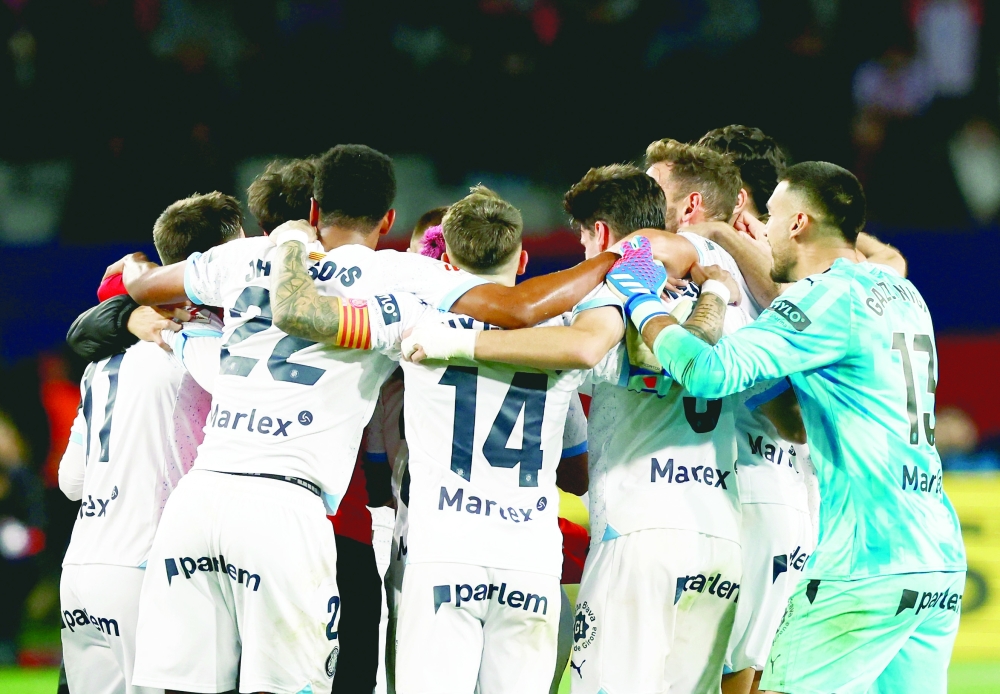 Soccer Football - LaLiga - FC Barcelona v Girona - Estadi Olimpic Lluis Companys, Barcelona, Spain - December 10, 2023 Girona players celebrate after the match REUTERS/Albert Gea
