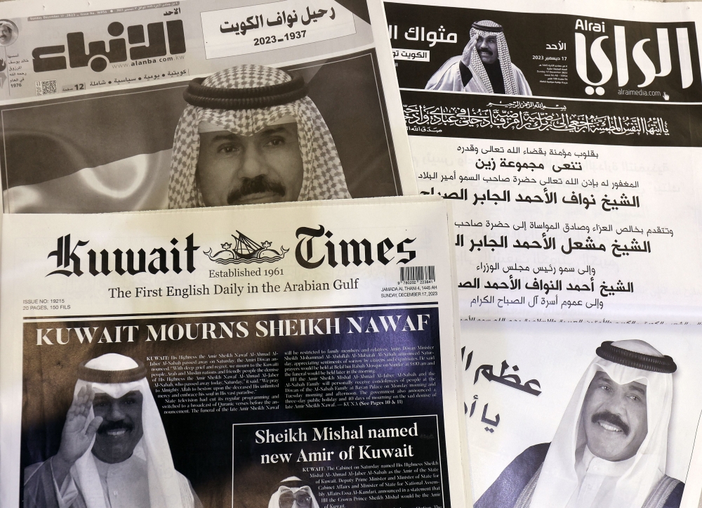 This picture taken on Sunday in Kuwait City shows a collection of Kuwaiti newspaper front pages, headlines featuring the death of Kuwait's Emir Shaikh Nawaf Al Ahmad al Sabah. - AFP
