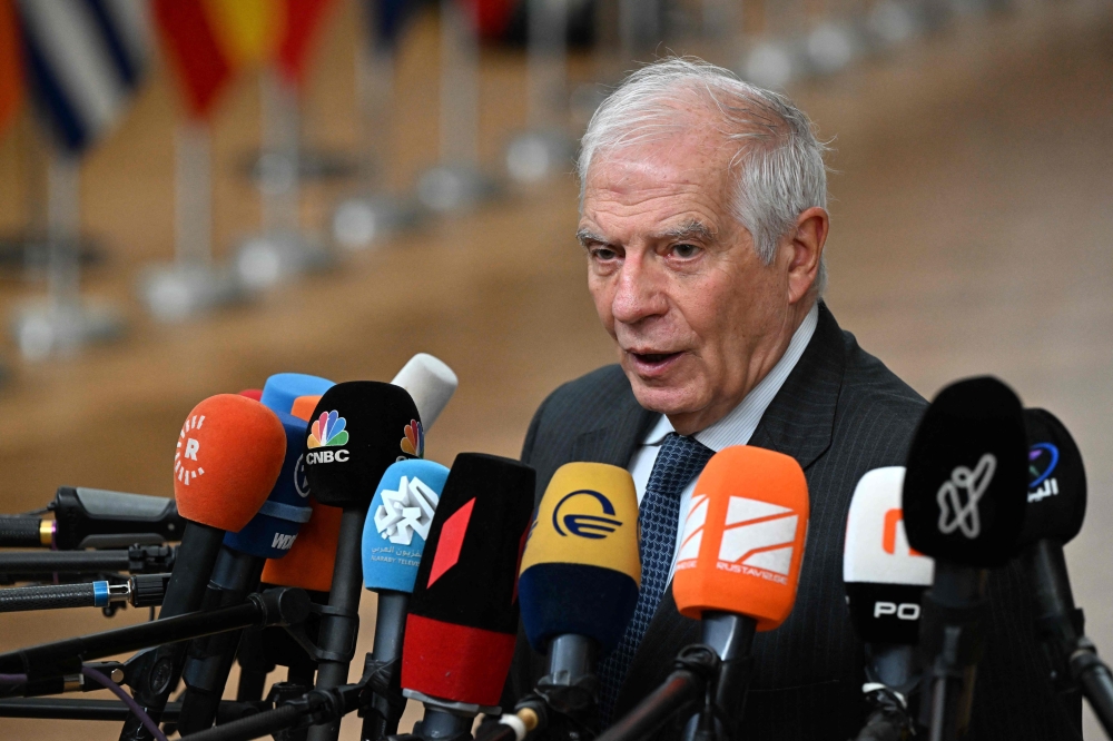 High Representative of the Union for Josep Borrell Fontelles talks to the media as he arrives at the European headquarters, in Brussels. — AFP 