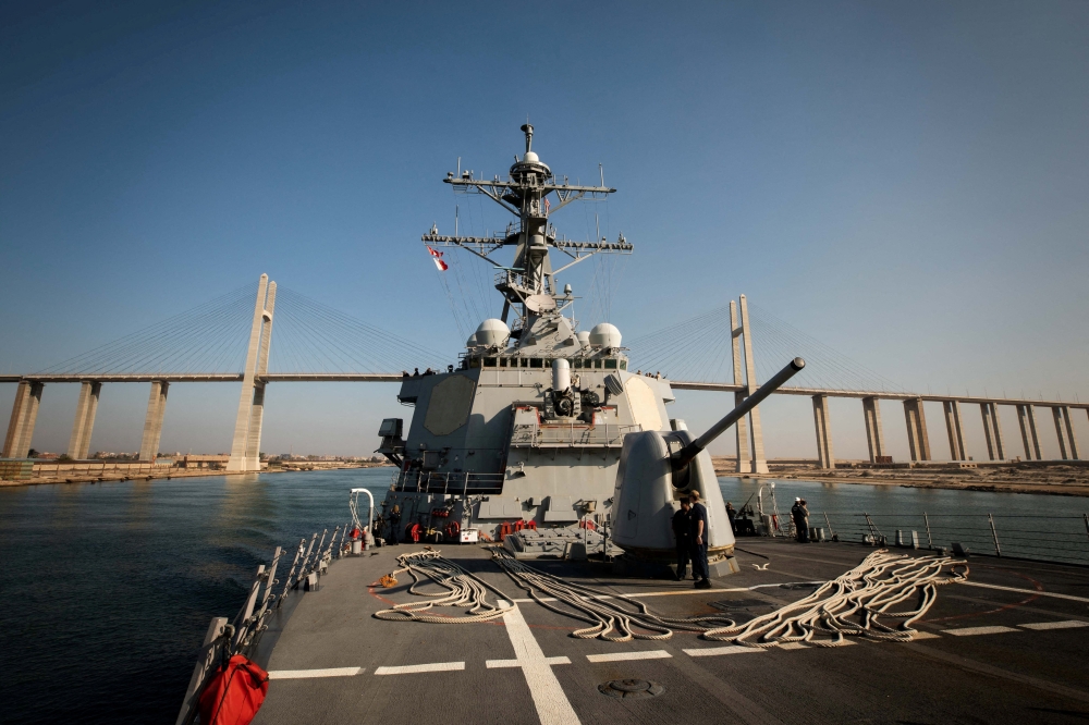 : The US Navy Arleigh Burke-class guided-missile destroyer USS Carney transits the Suez Canal