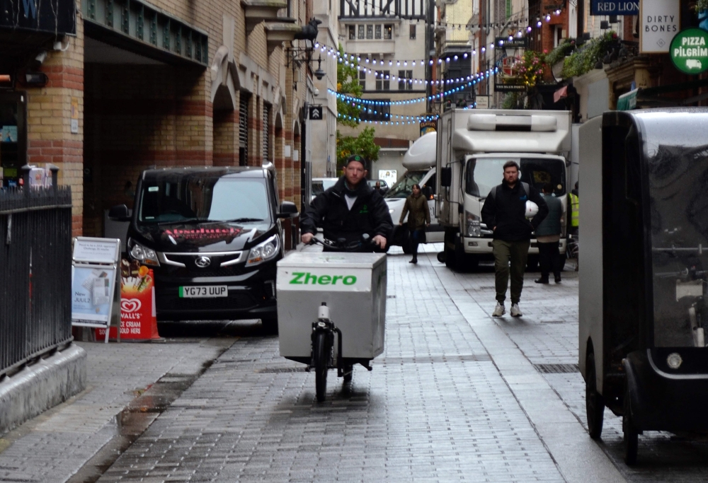 Co-founder of green logistics company Zhero, Joe Sharpe, rides a cargo bike 