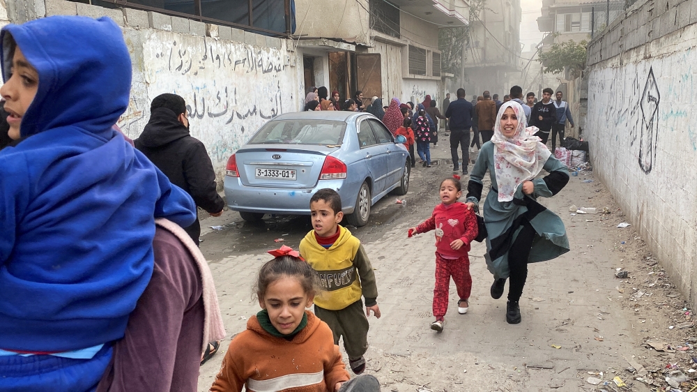 Palestinians react, at the site of an Israeli strike, amid the ongoing conflict between Israel and Hamas in Rafah, in the southern Gaza Strip. - Reuters