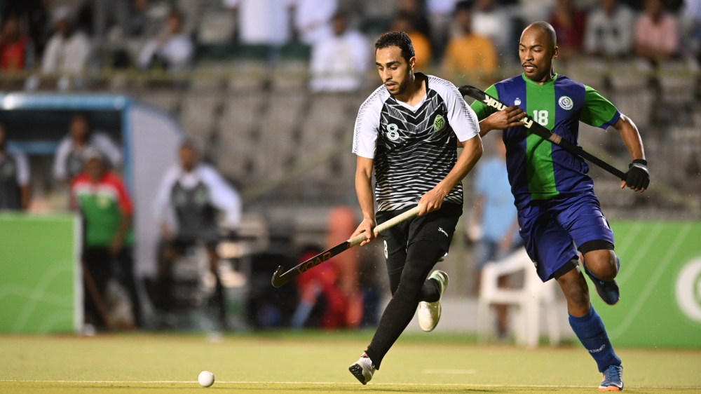 Sohar and Ahli Sidab players fight for the ball. -- Abdulwahid al Hamdani