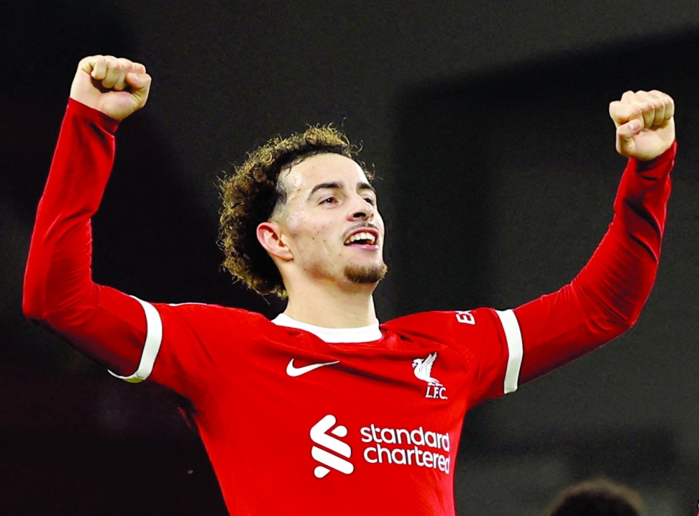 Soccer Football - Carabao Cup - Quarterfinal - Liverpool v West Ham United - Anfield, Liverpool, Britain - December 20, 2023 Liverpool's Curtis Jones celebrates scoring their fifth goal REUTERS