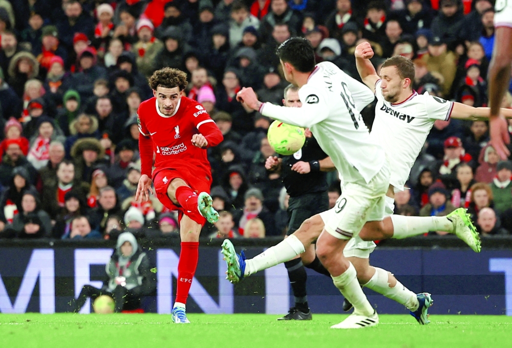 Liverpool's Curtis Jones shoots at goal REUTERS