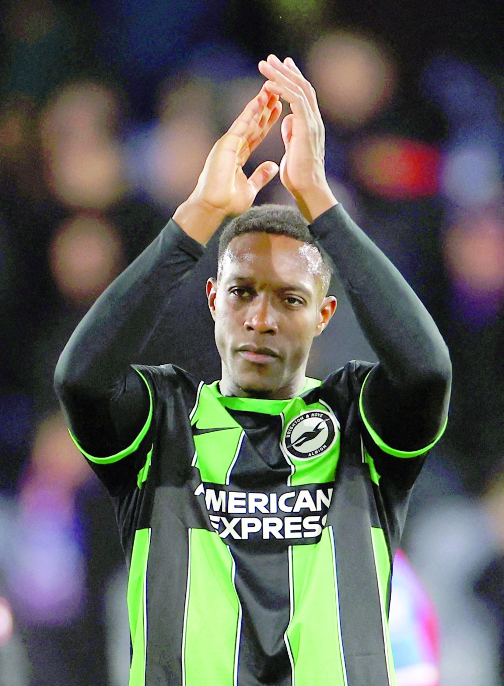 Brighton & Hove Albion's Danny Welbeck applauds fans after the match REUTERS
