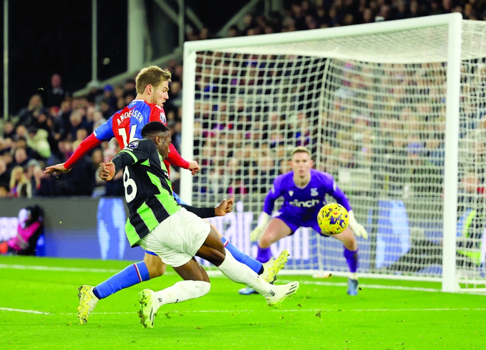 Brighton & Hove Albion's Danny Welbeck in action with Crystal Palace's Joachim Andersen REUTERS