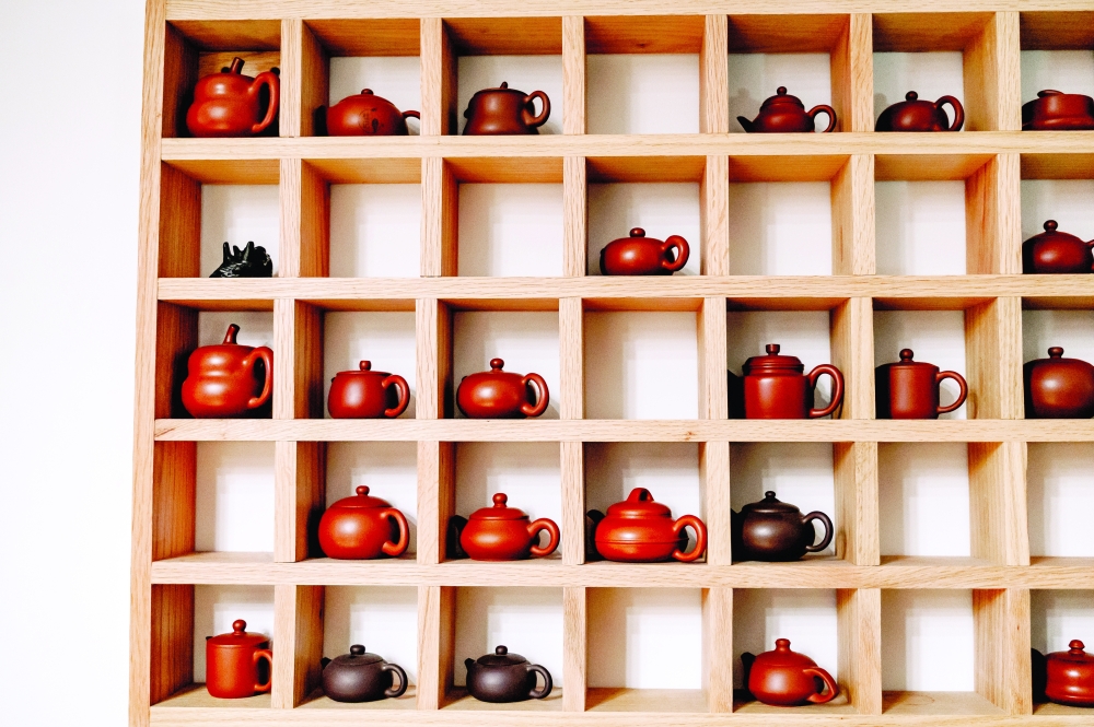 A wall of teapots at Floating Mountain in New York. 