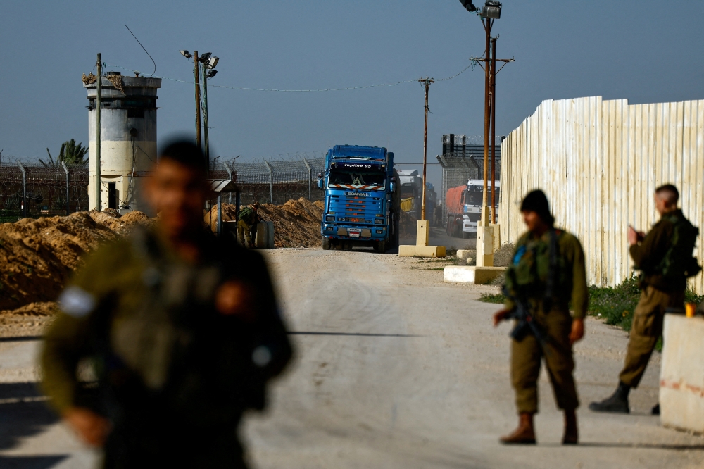 Aid trucks enter from Egypt en route to Gaza