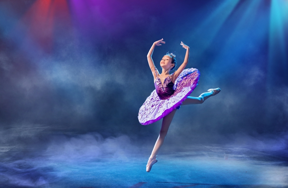 Little,Japanese,Ballerina,Dances,On,Stage,In,A,Lilac,Tutu