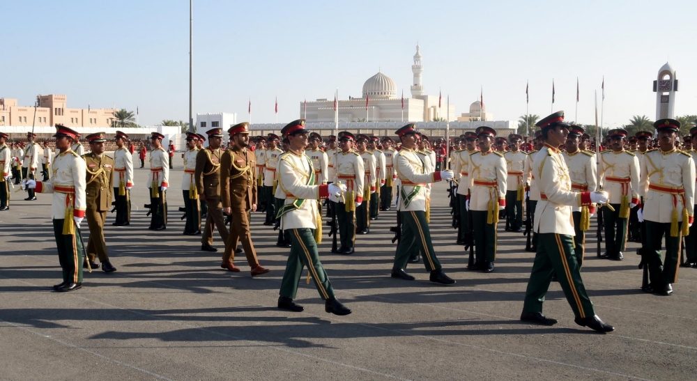 The chief guest inspects the front row of the passing out batch.