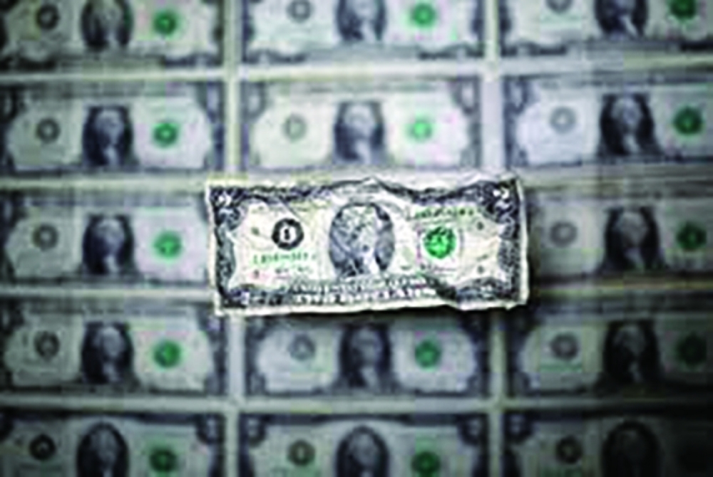 US dollar banknote is seen in this picture illustration