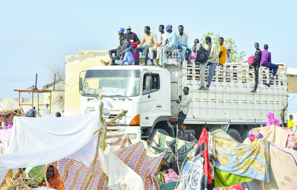 Civilians fleeing the war-torn Sudan ride a truck near the border crossing point in Renk County of Upper Nile State, South Sudan. — Reuters file photo