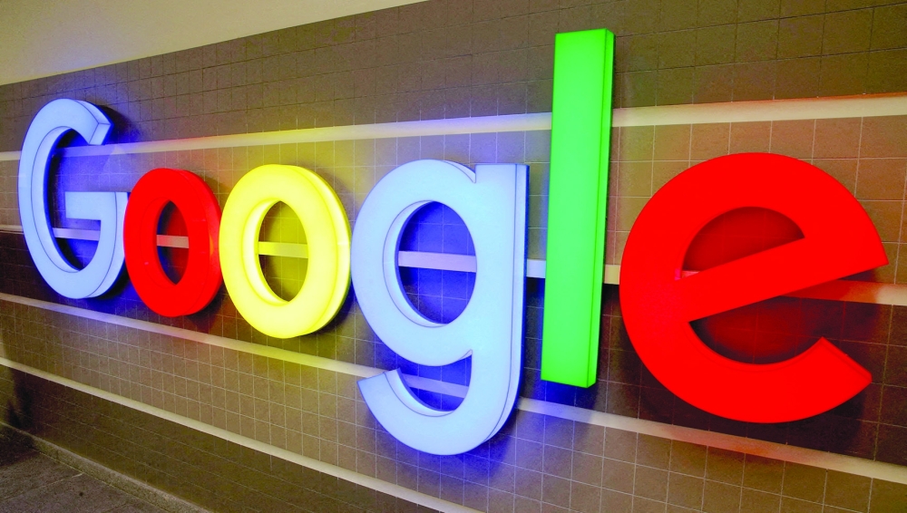An illuminated Google logo is seen inside an office building in Zurich. - Reuters File 
