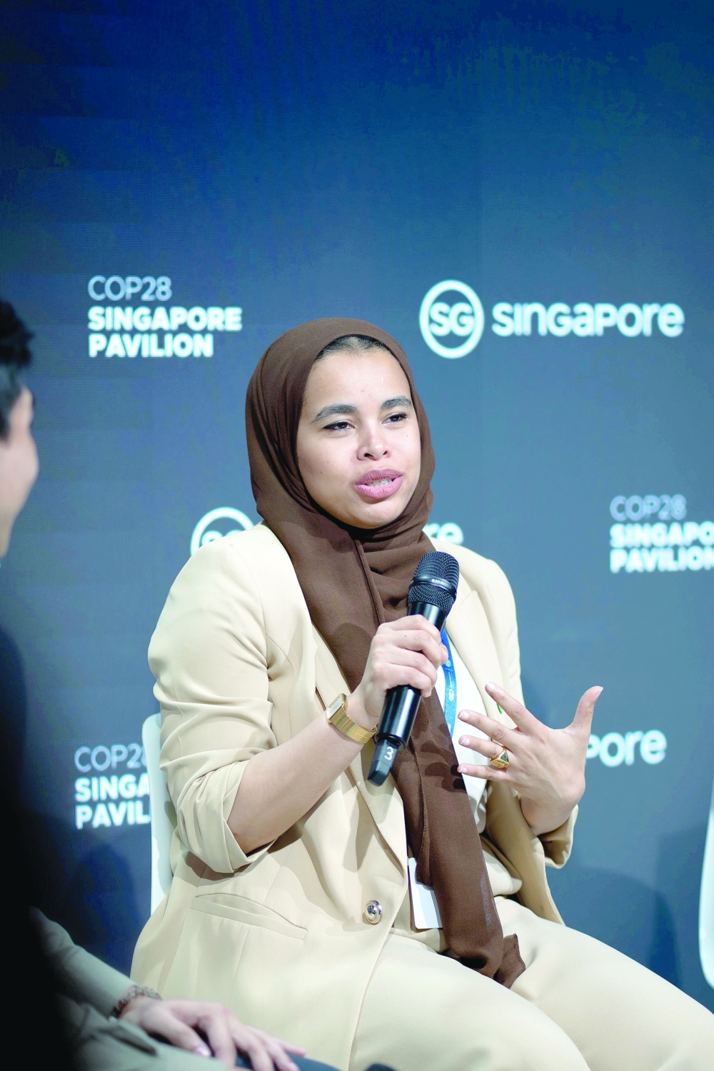 Rumaitha addressing the Roundtable Youth, Singapore Pavilion at COP28