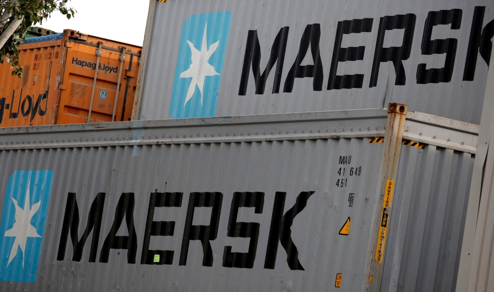 Maersk's logo is seen in stored containers at Zona Franca in Barcelona. - Reuters File