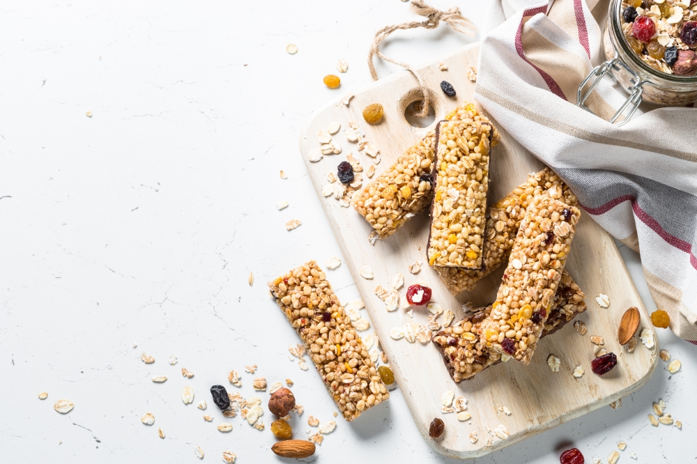 Cereal,Granola,Bar,With,Nuts,,Fruit,And,Berries,On,A