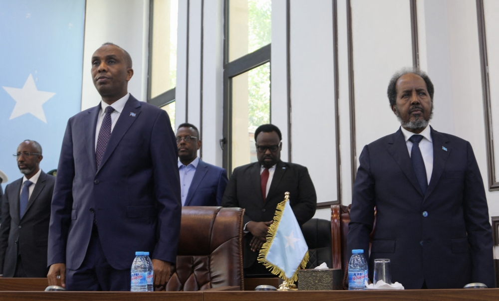 Somalia's President Hassan Sheikh Mohamud and Somalia's Prime Minister Hamza Abdi Barre stand after addressing the Parliament regarding the Ethiopia-Somaliland port deal, in Mogadishu, Somalia. — Reuters 