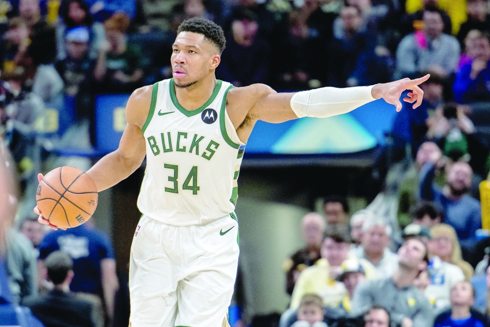 Indianapolis, Indiana, USA; Milwaukee Bucks forward Giannis Antetokounmpo (34) dribbles the ball in the second quarter against the Indiana Pacers at Gainbridge Fieldhouse. Mandatory Credit: Trevor Ruszkowski-USA TODAY Sports