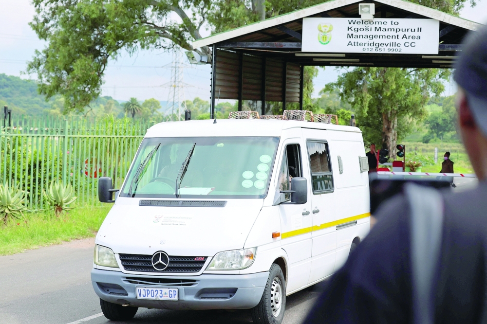 A Correctional Services' vehicle leaves the Atteridgeville Correctional Centre, where South African athlete Oscar Pistorius, convicted of killing his girlfriend Reeva Steenkamp in 2013, is released on parole, in Pretoria. - Reuters