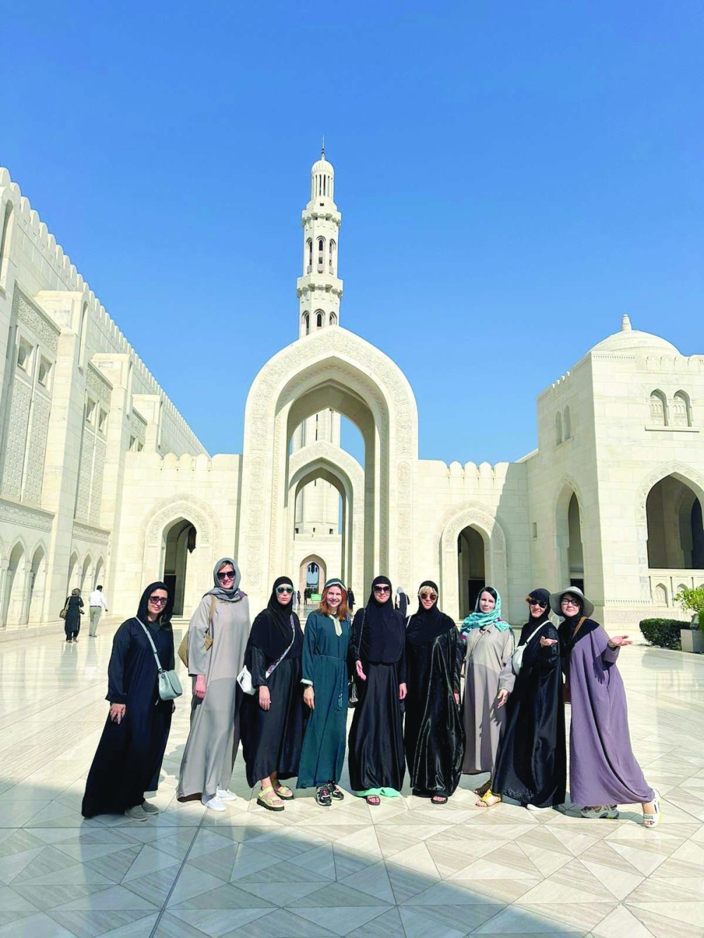 Russian tourists during their visit to the Sultan Qaboos Grand Mosque 
