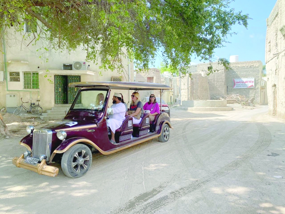 Russian tourists during their visit to Nizwa