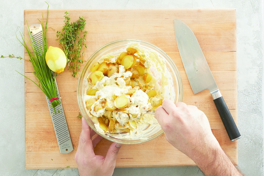 Bright herbs and lemon zest brighten the earthy potatoes. Food Stylist: Barrett Washburne. (Kerri Brewer/The New York Times)