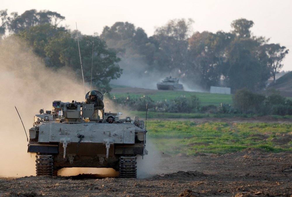 An Israeli tanker enters Israel from Gaza, amid the ongoing conflict 