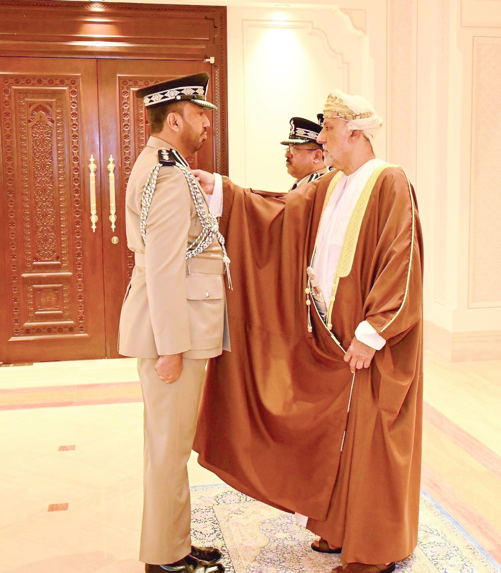 HH Sayyid Shihab bin Tarik al Said pinning the medals.