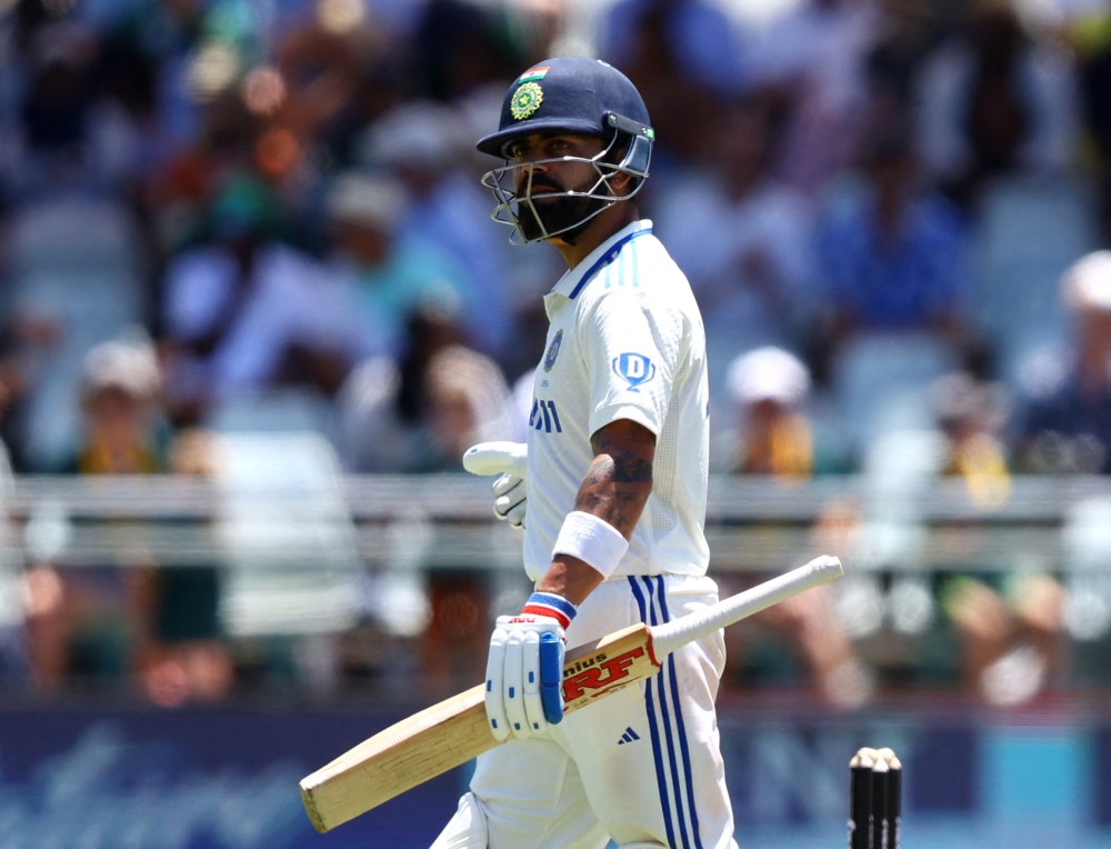 Cricket - Second Test - South Africa v India - Newlands Cricket Ground, Cape Town, South Africa - January 4, 2024 India's Virat Kohli walks off after losing his wicket REUTERS/Esa Alexander