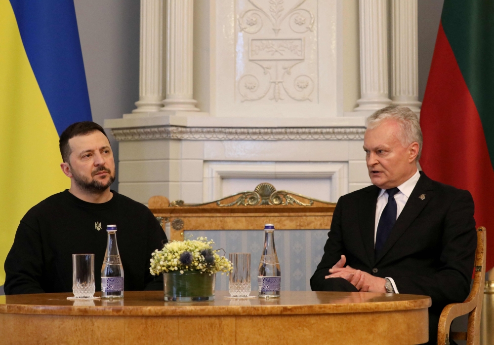 Lithuania's President Gitanas Nauseda (R) and Ukraine's President Volodymyr Zelensky hold talks at the Presidential Palace in Vilnius, Lithuania. — AFP 