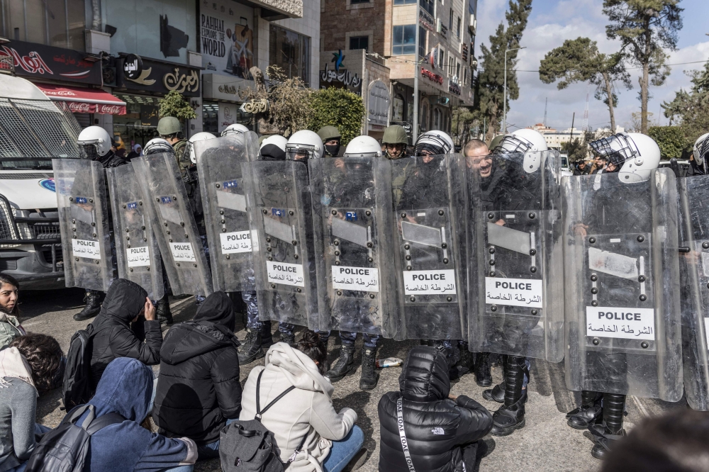 Demonstrators are confronted by Palestinian Authority security forces as they protest during a visit by US Secretary of State Antony Blinken in Ramallah. — AFP 