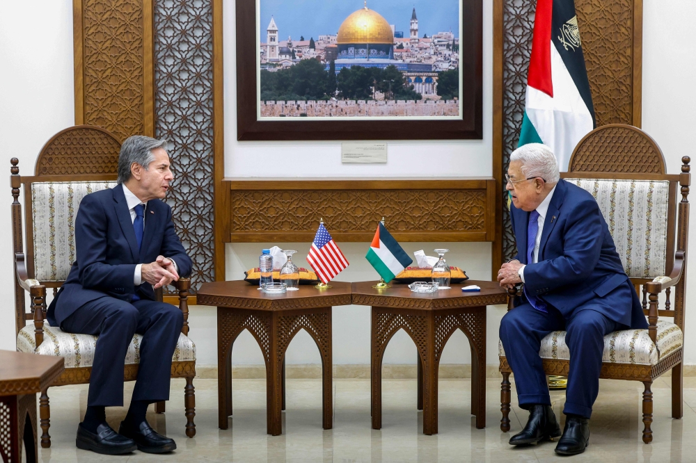 US Secretary of State Antony Blinken (L) meets with Palestinian president Mahmud Abbas, in the Muqata'a, in Ramallah. — AFP 