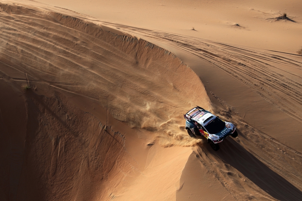Rallying - Dakar Rally - Stage 5 - Al-Hofuf to Shubaytah - Saudi Arabia - January 10, 2024 Nasser Racing's Nasser Al-Attiyah and co-driver Mathieu Baumel in action during stage 5 REUTERS/Hamad I Mohammed

