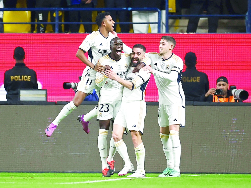 Real Madrid's Ferland Mendy celebrates scoring their second goal with team-mates REUTERS