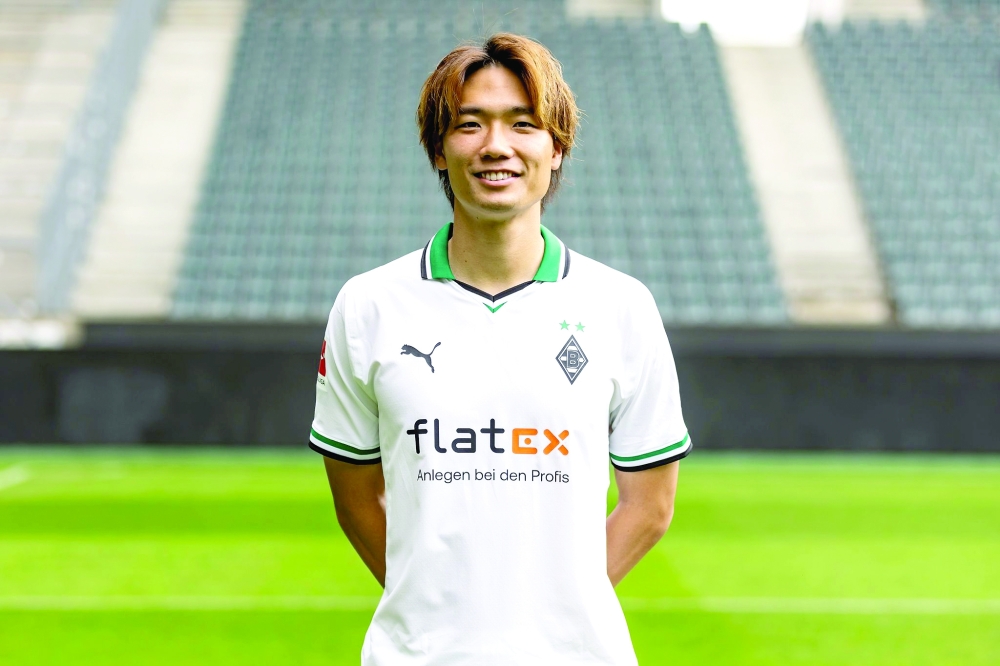Gladbach's Itakura joins Japan after being declared fit