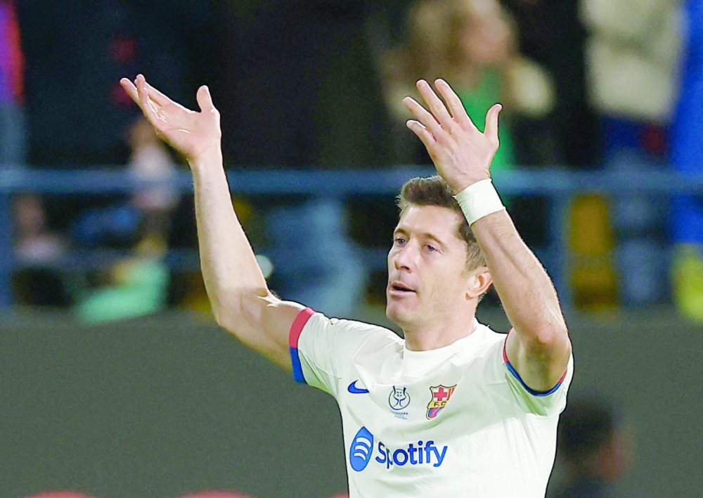 Soccer Football - Spanish Super Cup - Semi Final - FC Barcelona v Osasuna - Al Awwal Park, Riyadh, Saudi Arabia - January 11, 2024 FC Barcelona's Robert Lewandowski celebrates scoring their first goal REUTERS/Juan Medina