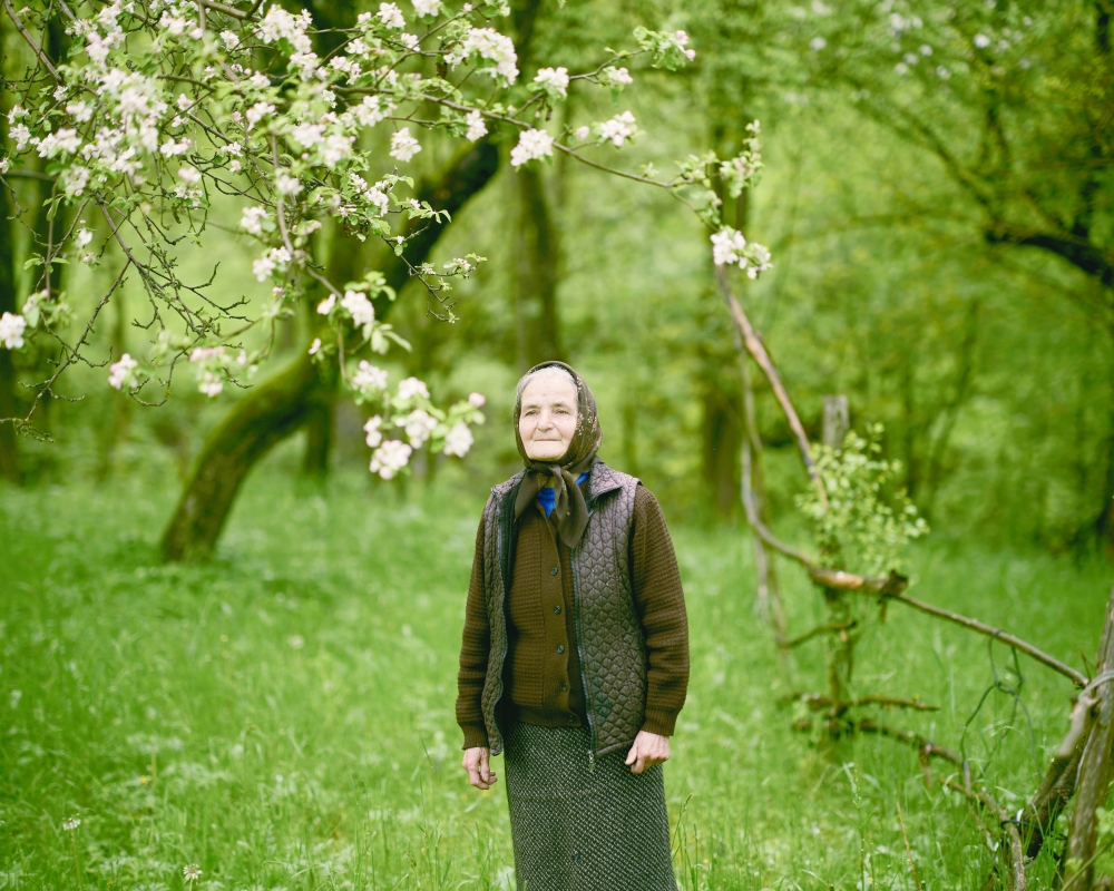 Silvia Dan in her beech tree orchard, between Nucsoara and Slatina, Romania, May 17, 2023. 