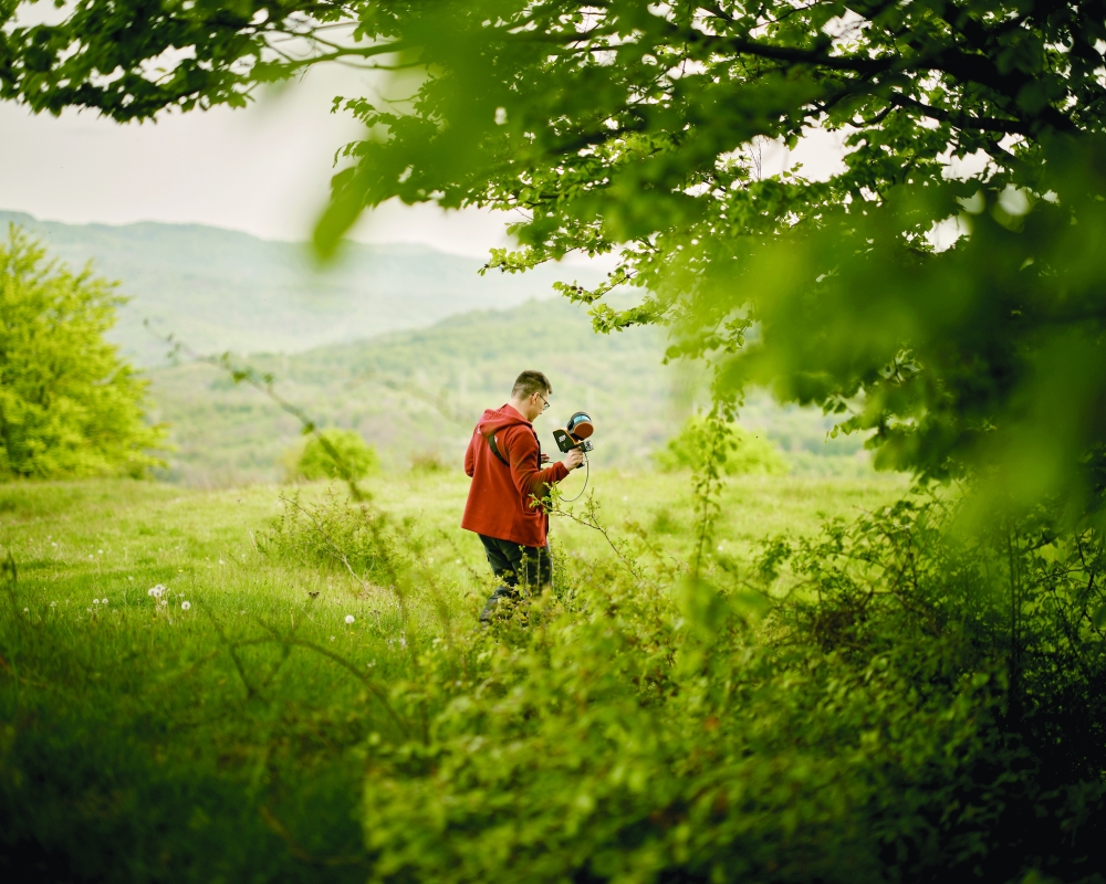 Sergiu Florea of Forest Design, a forestry company, carries a scanner that uses lidar, a laser technology, to generate three-dimensional images of many of the ancient trees, inside and out, in Nucsoara, Romania.