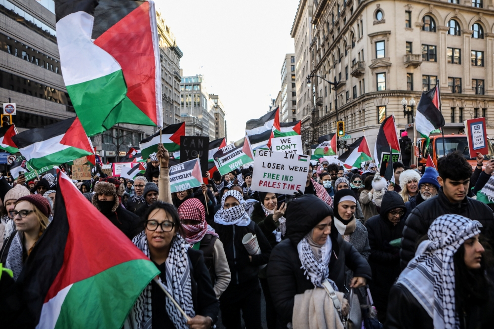 Demonstrators participate in the "March on Washington for Gaza," in support of the Palestinian people, in Washington, U.S., January 13, 2024. REUTERS/Anna Rose Layden
