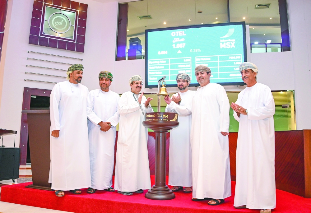 MSX officials and guests ring the bell for the inauguration of liquidity provider service.