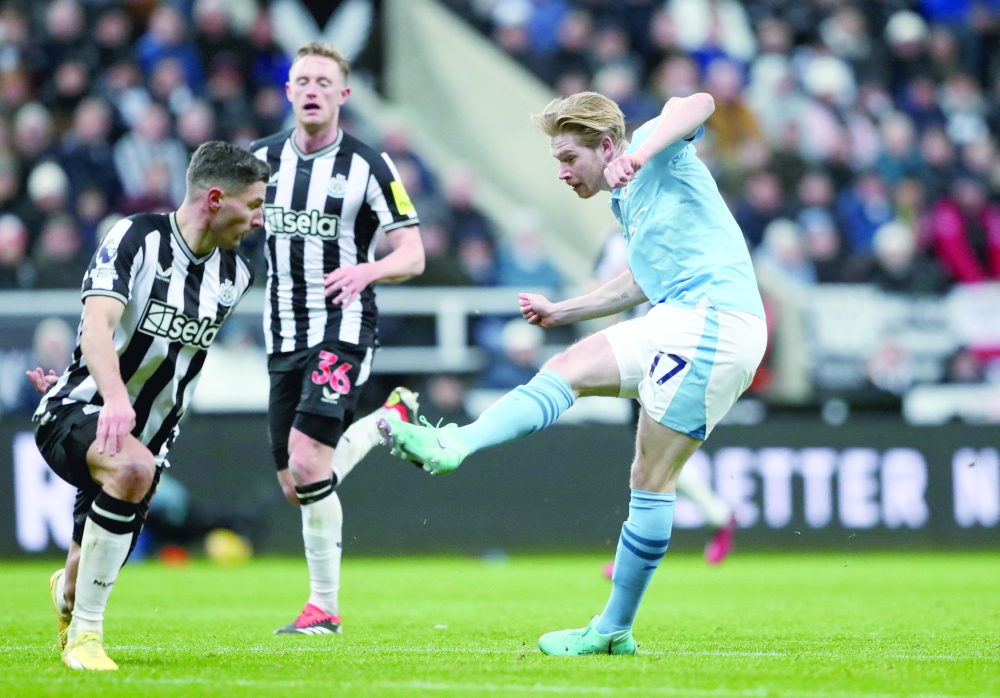 Soccer Football - Premier League - Newcastle United v Manchester City - St James' Park, Newcastle, Britain - January 13, 2024 Manchester City's Kevin De Bruyne scores their second goal. REUTERS