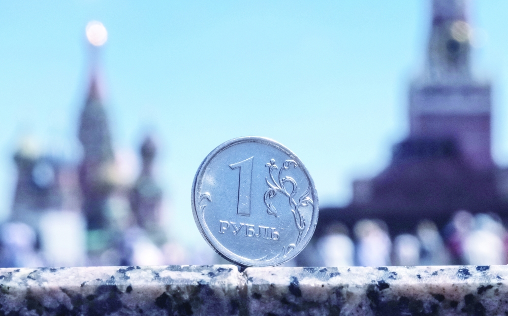 One Russian rouble coin pictured in front of a Kremlin tower in Moscow. — Reuters
