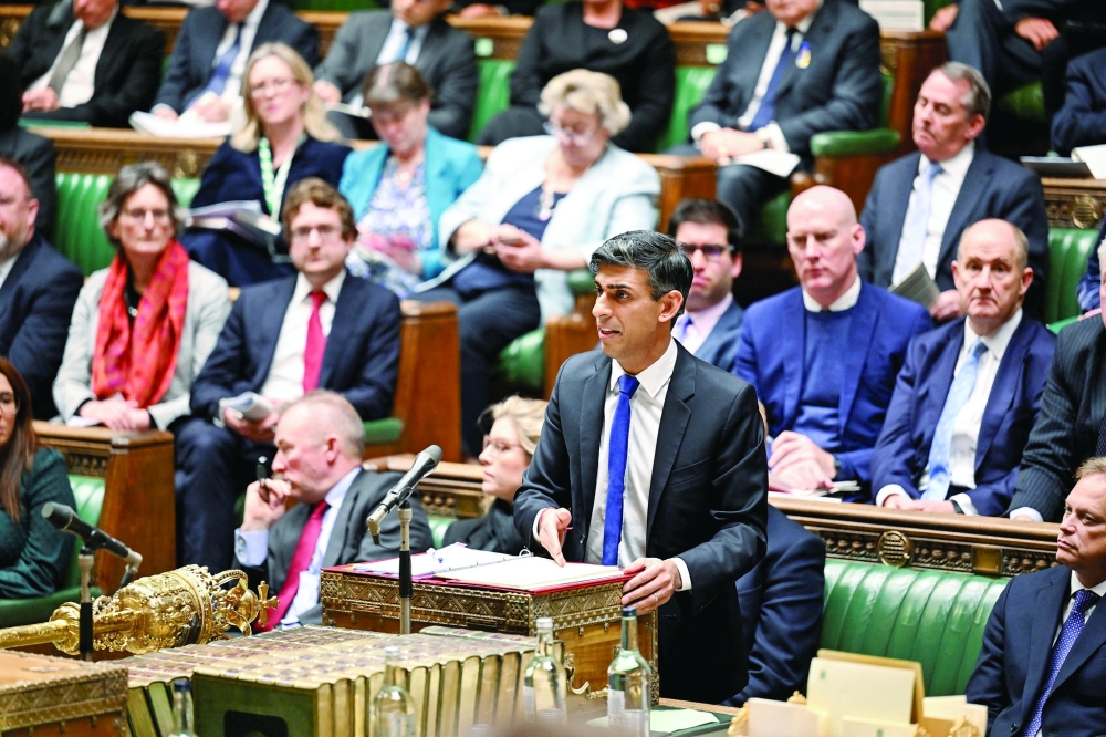 Britain's PM Rishi Sunak delivers a ministerial statement in the House of Commons, in London. — Reuters