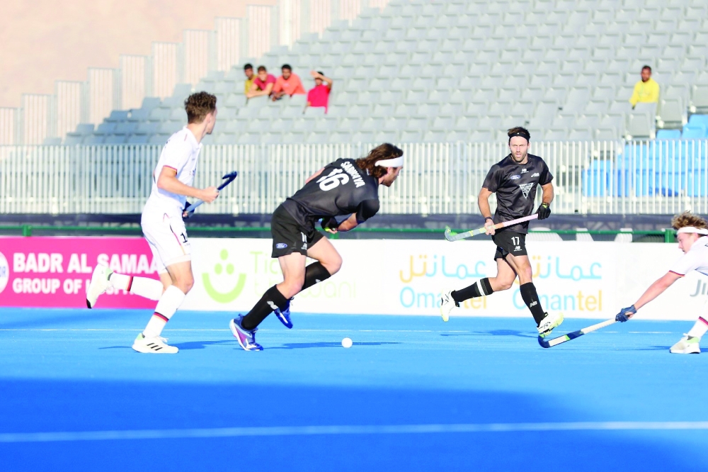 Kiwis hold Germany, Chile revive semi hopes