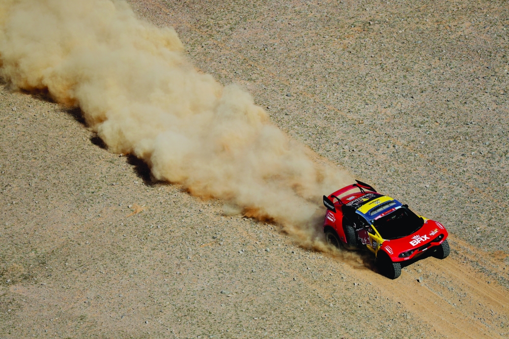 Rallying - Dakar Rally - Stage 9 - Hail to Al Ula - Saudi Arabia - January 16, 2024 Bahrain Raid Xtreme's Sebastien Loeb and co-driver Fabian Lurquin in action during stage 9 REUTERS/Hamad I Mohammed