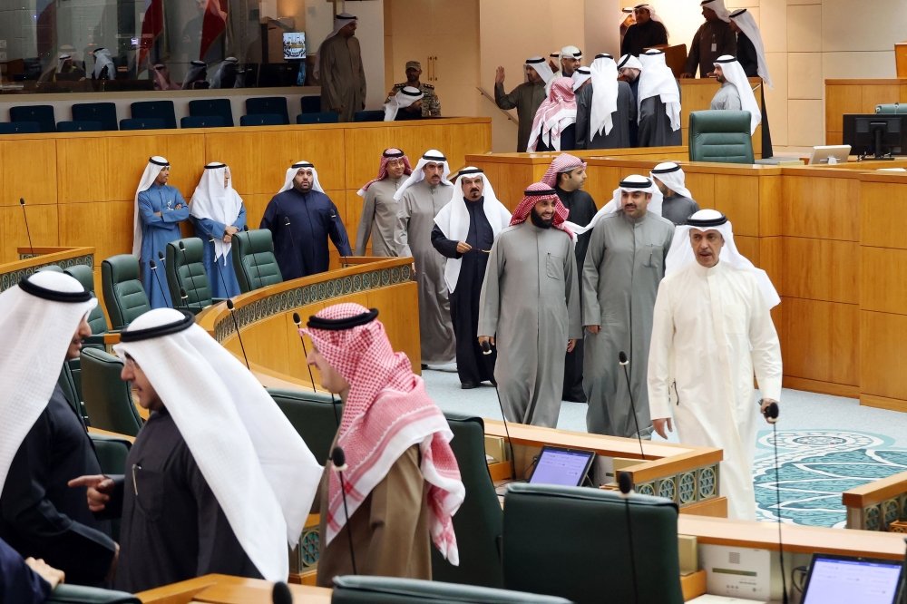 Kuwaiti Members of Parliament arrive to attend a parliament session at the National Assembly in Kuwait City on January 16, 2024. 