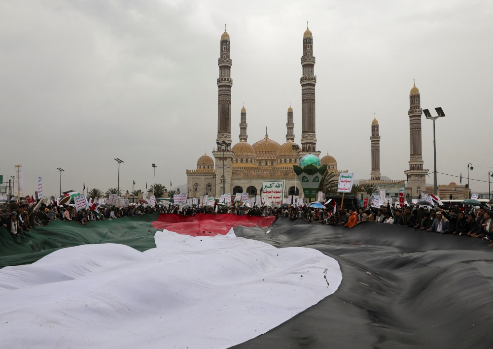 A giant Palestinian flag during a rally in Sanaa, Yemen January 19, 2024