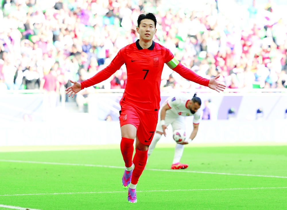 Soccer Football - AFC Asian Cup - Group E - Jordan v South Korea - Al Thumama Stadium, Doha, Qatar - January 20, 2024 South Korea's Son Heung-min celebrates scoring their first goal REUTERS/Molly Darlington