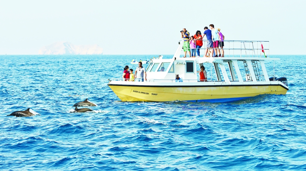 Tourists watch dolphins in Musandam, in this illustration photo.